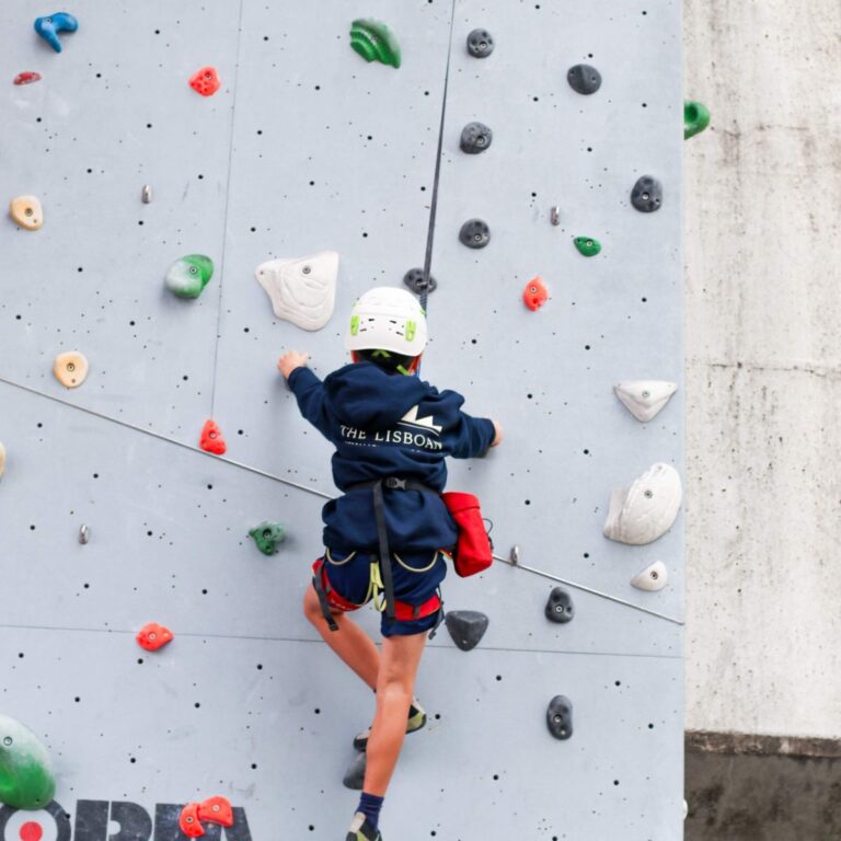 Student on the climbing wall