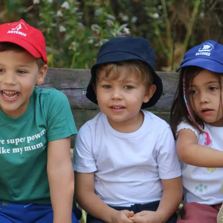 Young children playing outdoors at The Lisboan