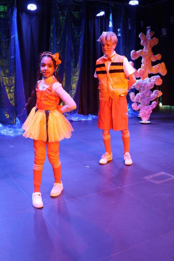 Students performing in the school production