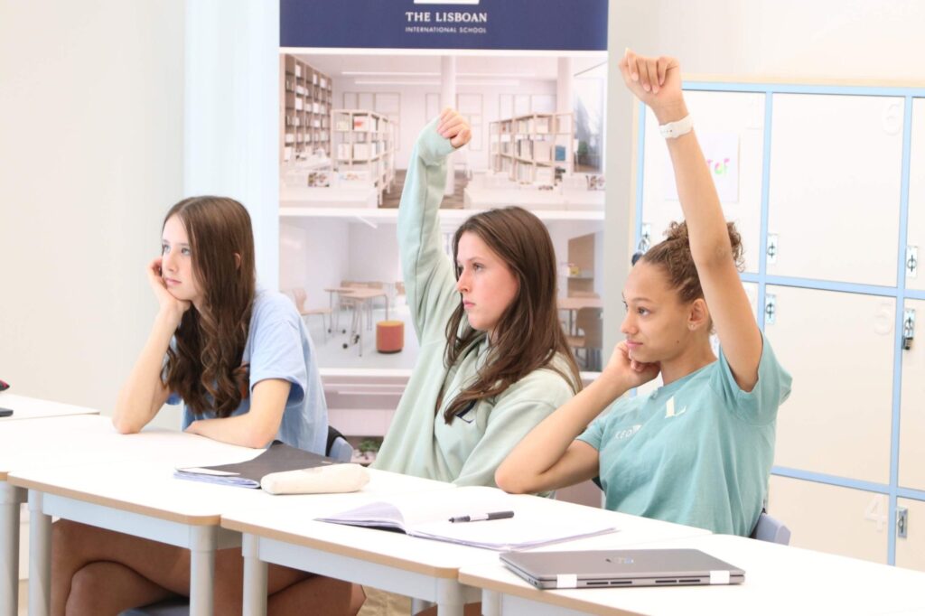 Secondary students taking part in discussion