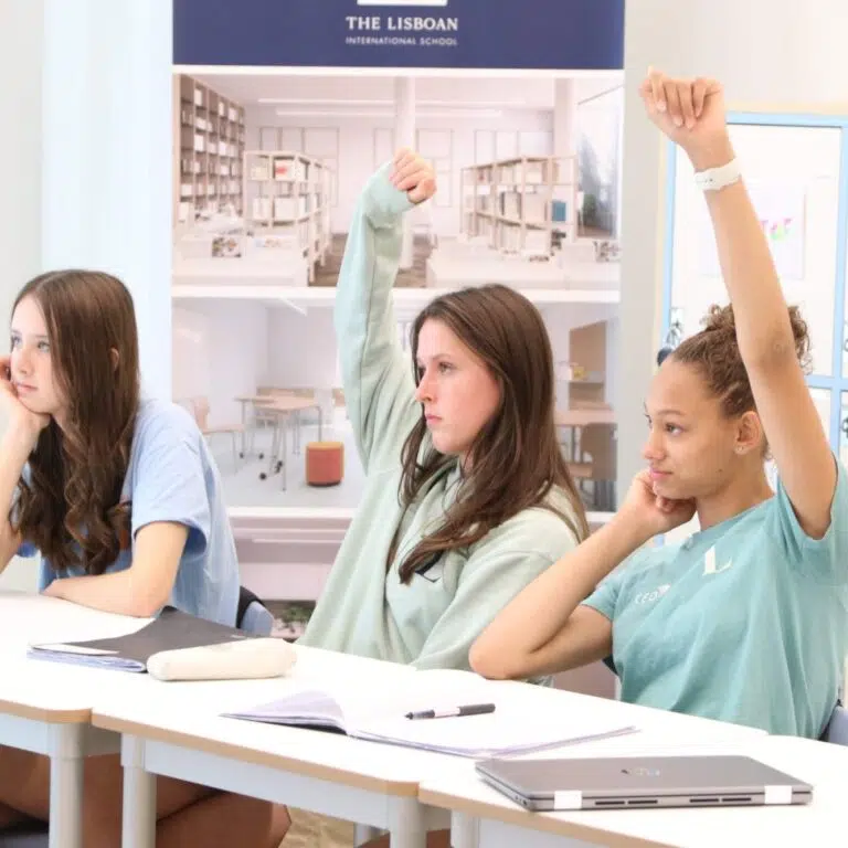Secondary students taking part in discussion