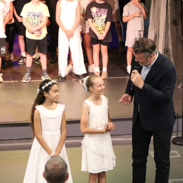 Students performing in the school show