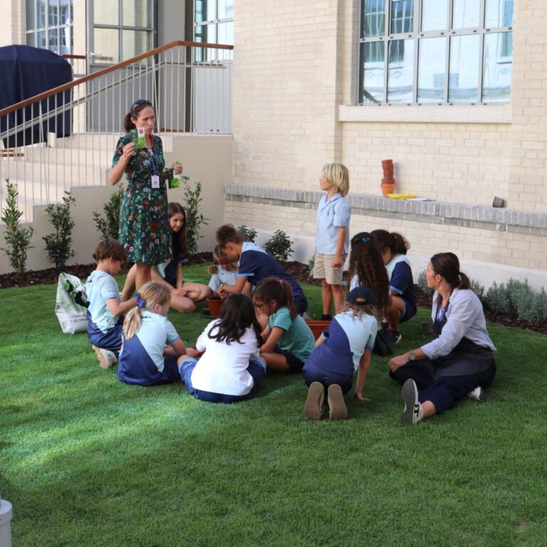 Students gardening together at The Lisboan