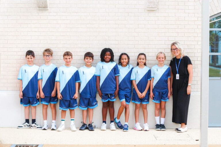 Year 5 students in school uniform